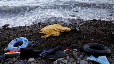 The covered body of a migrant man lies at a beach after being washed ashore on the Greek island of Lesbos November 1, 2015. (Reuters)