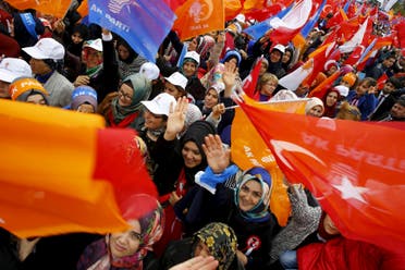 Supporters of the ruling AK Party wave national and party flags during an election rally in Ankara, Turkey, October 31, 2015