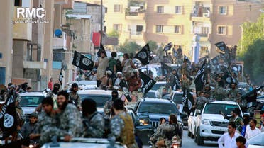 This undated file image posted on Monday, June 30, 2014, shows ISIS militants parade in Raqqa, north Syria. (File photo: AP)