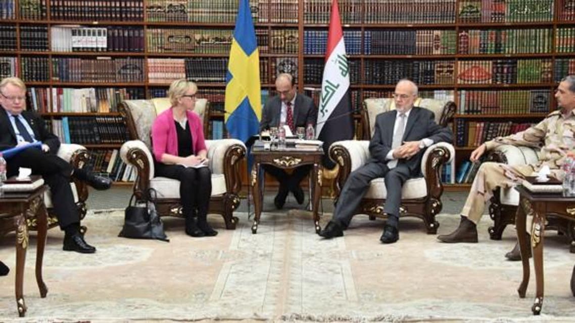 وزير الخارجية العراقي إبراهيم الجعفري مع نظيرته السويدية ووزير الدفاع السويدي