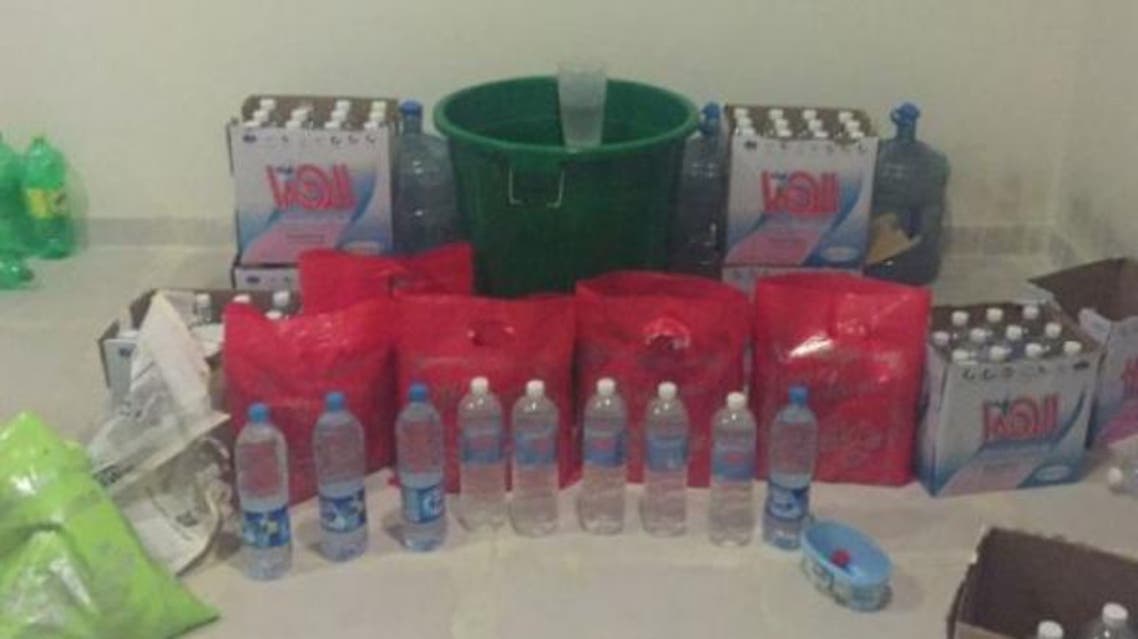 Liquor bottles found in an apartment in Riyadh's Al-Faiyha District. — SG photo