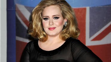 In this Feb. 21, 2012 file photo, performer Adele arrives for the Brit Awards 2012 at the O2 Arena in London. (AP)