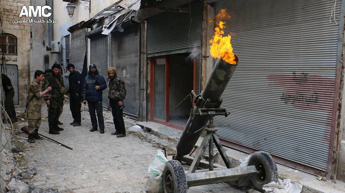 Syrian rebels firing locally made shells against the Syrian government forces, in Aleppo, Syria. AP