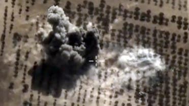 A video grab from October 15, 2015 shows an image taken from footage on the Russian Defence Ministry's official website, purporting to show an explosion after airstrikes carried out by Russian air force in the Syrian province of Idlib. (AFP)