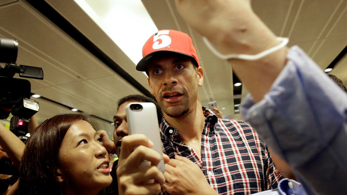 Former Manchester United player Rio Ferdinand (pictured here in Singapore last year) was reportedly one of the biggest investors in the schemes (AP)