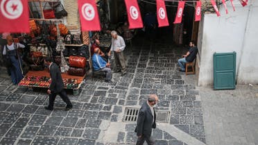 People walk through the Medina market in Tunis, Tunisia, Monday, Oct. 26, 2015. (AP)