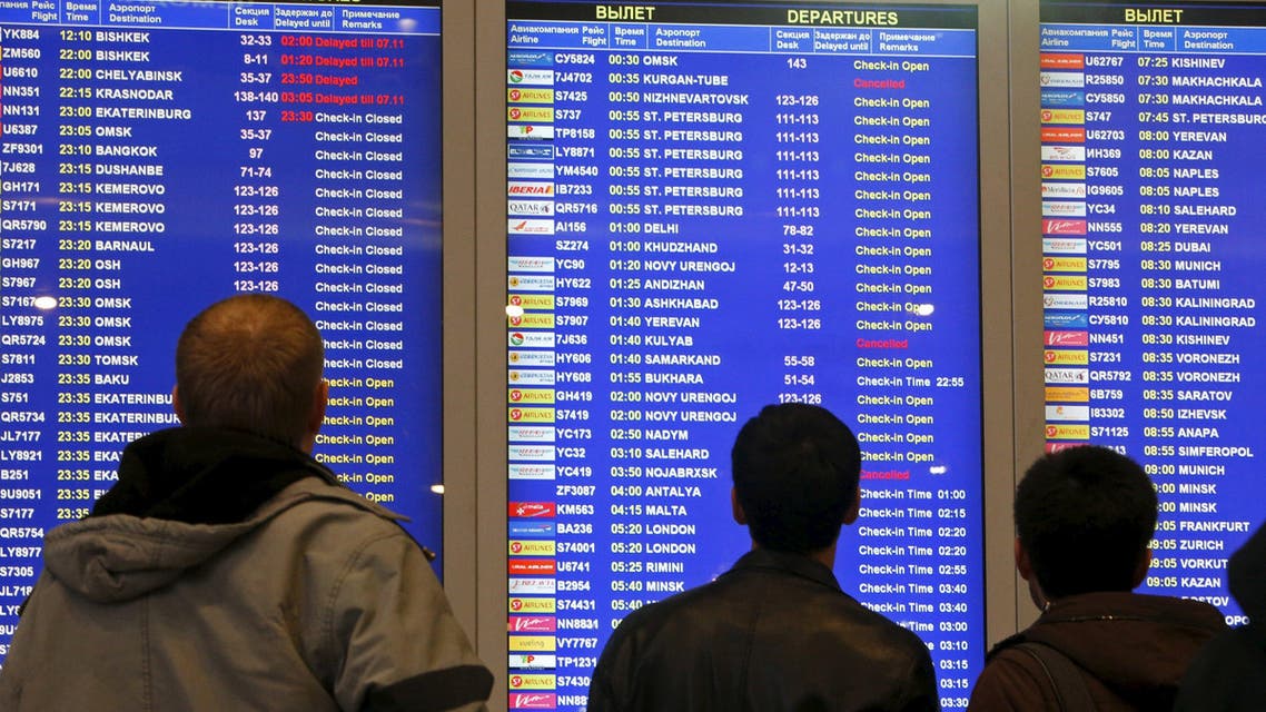 People look at an information board at Domodedovo airport outside Moscow, Russia, November 6, 2015. (Reuters)