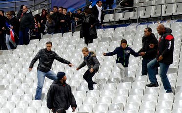 Soccer fans leave the Stade de France stadium after an international friendly soccer match in Saint Denis, outside Paris, Friday, Nov. 13, 2015.  (AP)