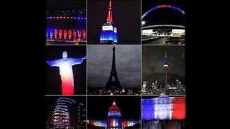 Monuments light up red, blue and white in solidarity with France 