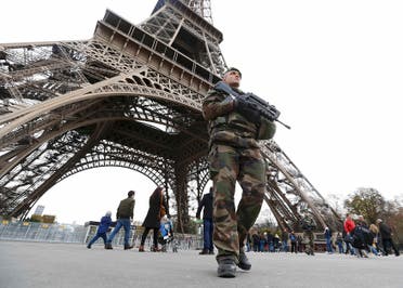 French military patrol near the Eiffel Tower the day after a series of deadly attacks in Paris , November 14, 2015. (Reuters)