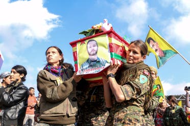 Kurdish People's Protection Units (YPG) fighters carry the coffin of fellow fighter John Robert Gallagher, a Canadian who died on November 4 in battle with Islamic State fighters, during his funeral in Hasaka, Syria November 12, 2015. 