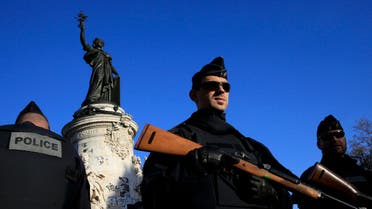 Police stand guard in Place de la Republique following the series of deadly attacks in Paris, November 15, 2015. (Reuters)