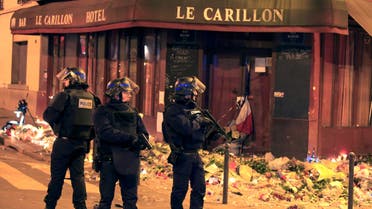Police react to a suspicious vehicle near La Carillon restaurant following a series of deadly attacks in Paris. (Reuters)