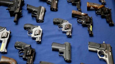 Guns seized by the police are displayed during a news conference in New York, Tuesday, Oct. 27, 2015. (AP Photo/Seth Wenig)