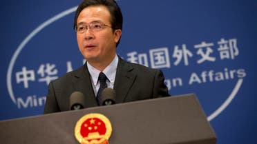 Chinese foreign ministry spokesman Hong Lei speaks during a daily briefing at the Ministry of Foreign Affairs office in Beijing Thursday, Nov. 19, 2015.