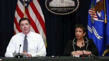 U.S. Attorney General Loretta Lynch (R) and FBI Director James Comey hold a media briefing at the Justice Department in Washington November 19, 2015. 