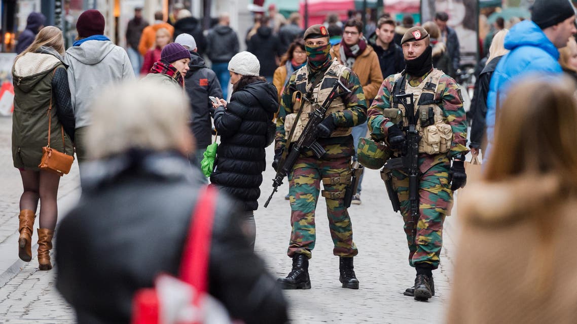 Soldiers from the Belgian army patrol in the picturesque Grand Place in Brussels on Friday, Nov. 20, 2015.