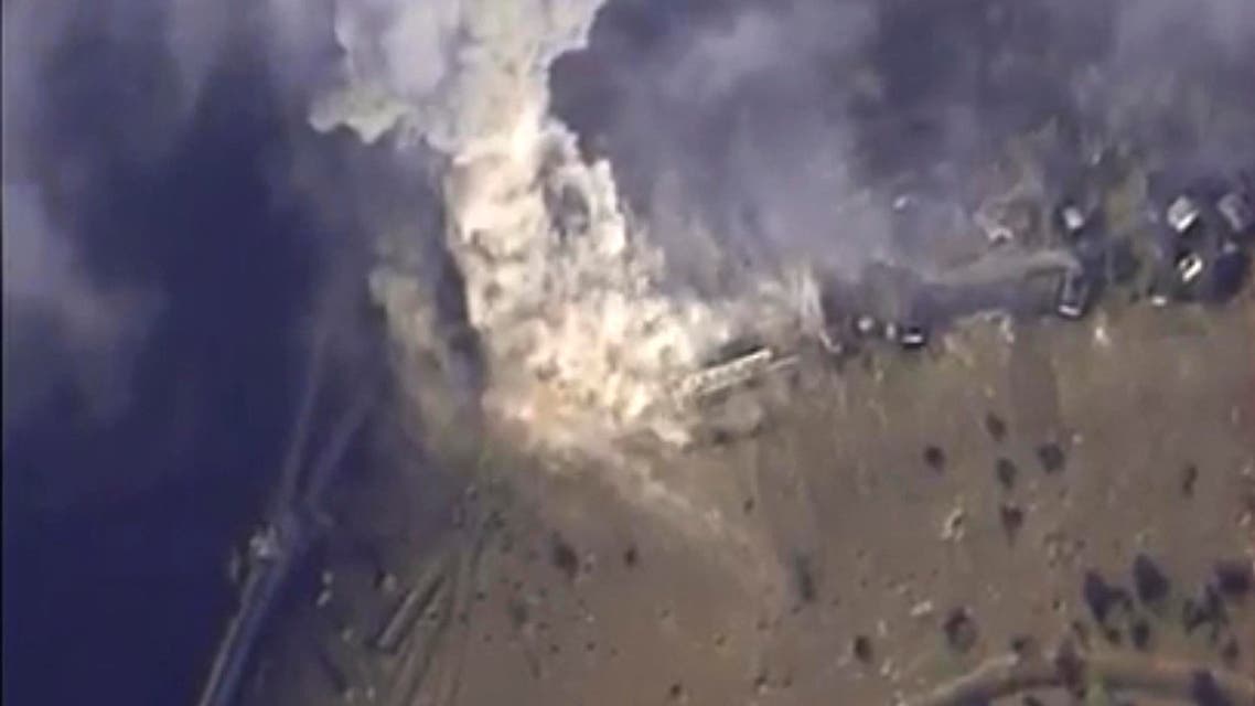 This file photo made from the footage taken from Russian Defense Ministry official web site on Monday, Nov. 2, 2015 shows a target hit during s Russian air raid in Syria.