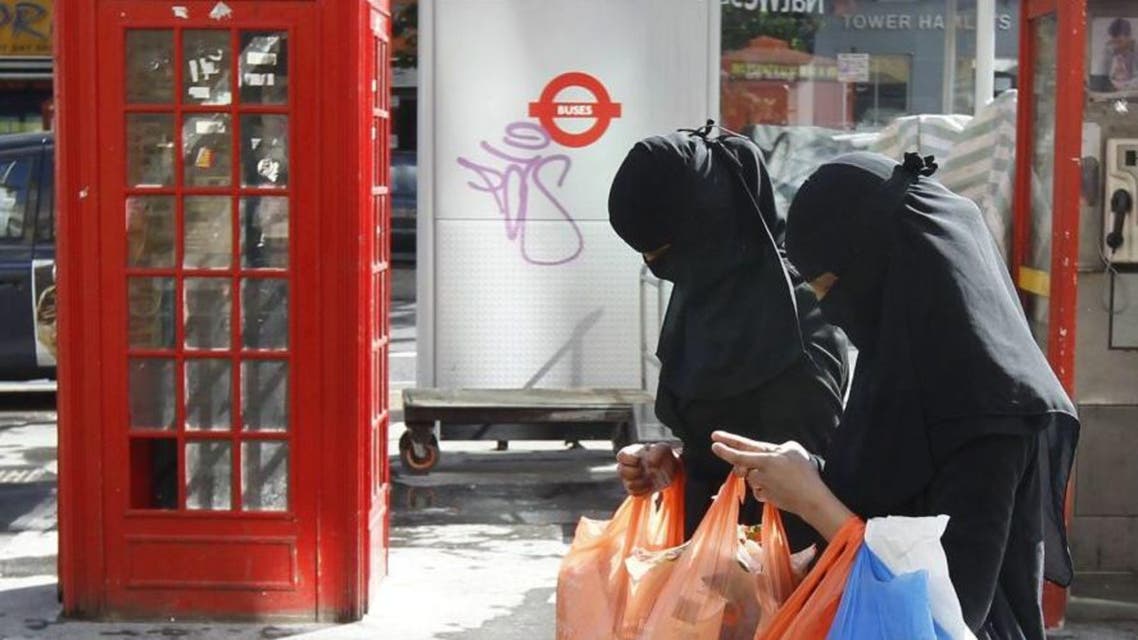 Women wears full-face veils as they shop in London. (File photo: Reuters)