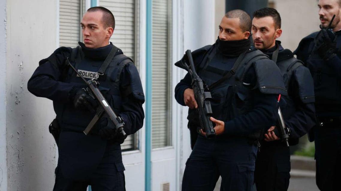 French police secure the area as shots are exchanged in Saint-Denis, France, near Paris, November 18, 2015 during an operation to catch fugitives from Friday night's deadly attacks in the French capital. | Reuters