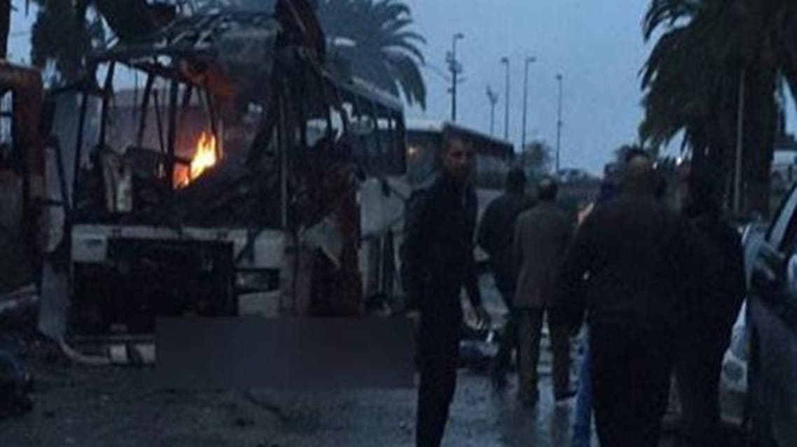 Tunis tunisia bus explosion Early photographs showed a torched bus surrounded by onlookers. (Photo courtesy: businessnews.com.tn)