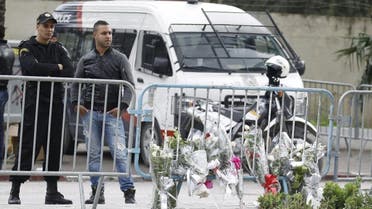 A Tunisian policeman stands guard near the scene of a suicide bomb attack in Tunis, Tunisia November 25, 2015. (Reuters)