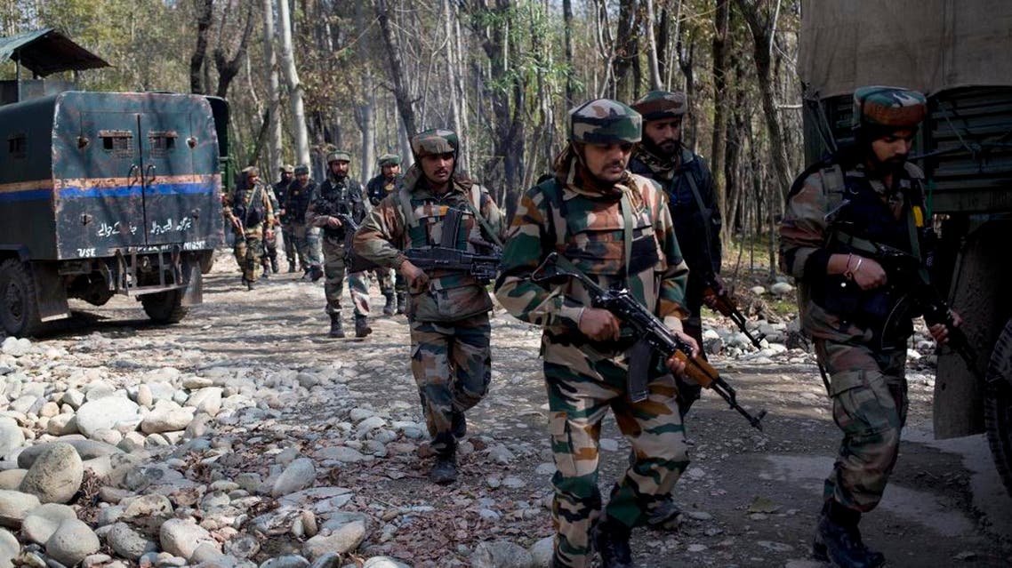 Indian army soldiers patrol near the site of a gunbattle with suspected rebels in Bungham village, northwest of Srinagar, Indian controlled Kashmir, Wednesday, Oct. 21, 2015 | AP