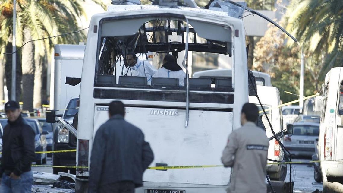Tunisian forensics police inspect a Tunisian presidential guard bus at the scene of a suicide bomb attack in Tunis, Tunisia November 25, 2015. (Reuters)