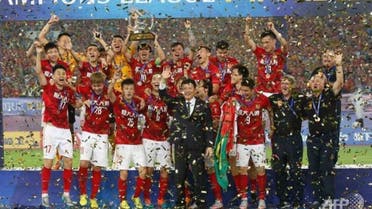 China's Guangzhou Evergrande celebrate their win in the AFC Champions League football final against UAE's Al Ahli in Guangzhou