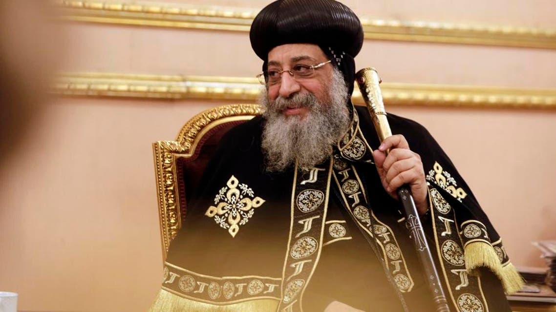 Coptic Pope Tawadros II, the 118th pope of the Coptic Church of Egypt, meets with French Defense Minister Jean-Yves Le Drian as he receives condolences for Egyptian Christians captured and killed by militants, at St. Mark's Cathedral in Cairo, Egypt, Tuesday, Feb. 17, 2015. The Islamic State group issued a grisly video on Sunday of the beheadings of 21 Egyptian Christians, mainly young men from impoverished families who were kidnapped after traveling to Libya for work.(AP Photo/Amr Nabil)