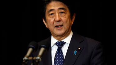 Japanese Prime Minister Shinzo Abe speaks during a press conference in Kuala Lumpur, Malaysia, Sunday, Nov. 22, 2015. (AP Photo/Lai Seng Sin)