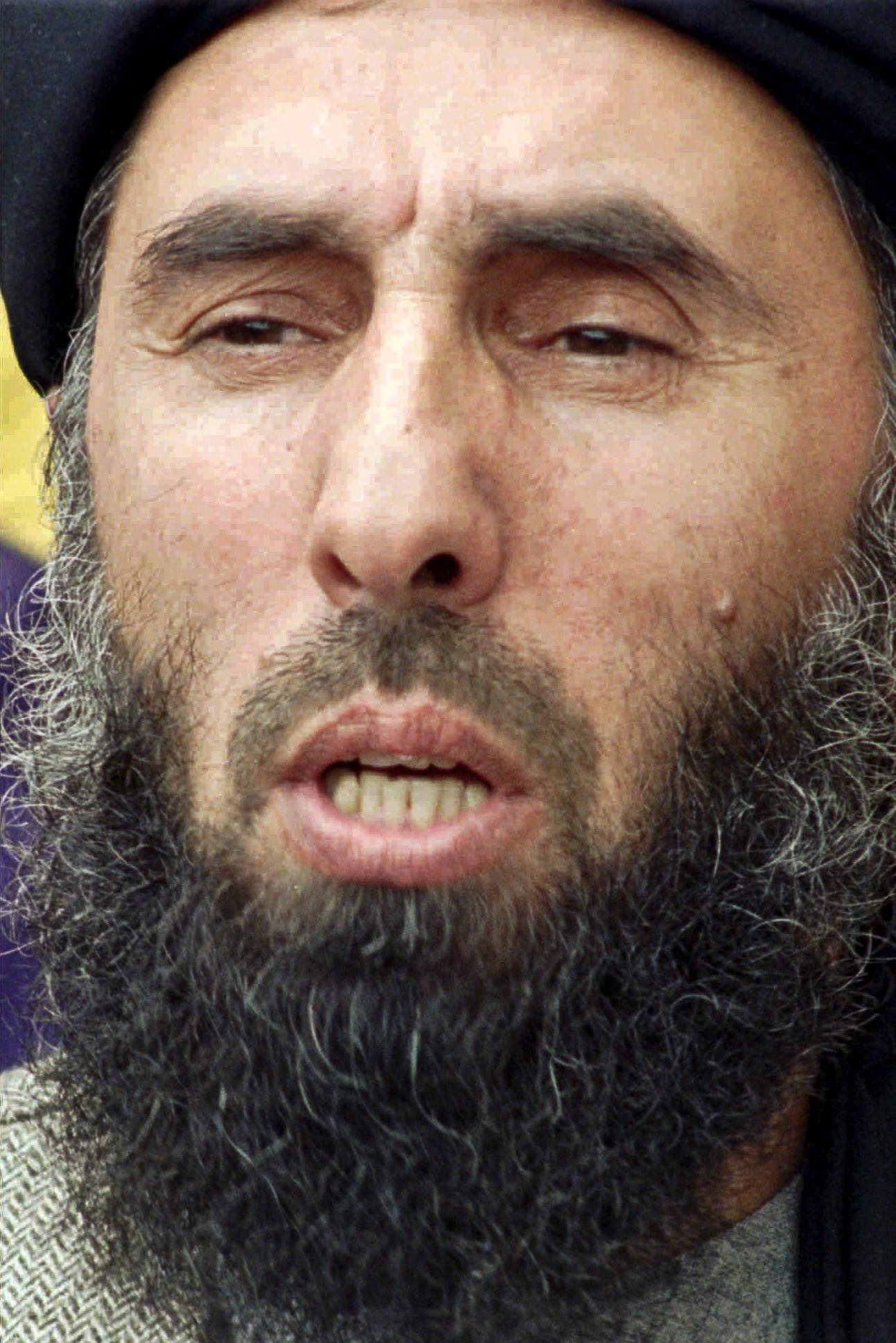 This Feb. 13, 1996, file photo shows Gulbuddin Hekmatyar, Afghan rebel leader and chief of the insurgent group Hezb-e-Islami Gulbuddin, speaking at a news conference in Islamabad, Pakistan.