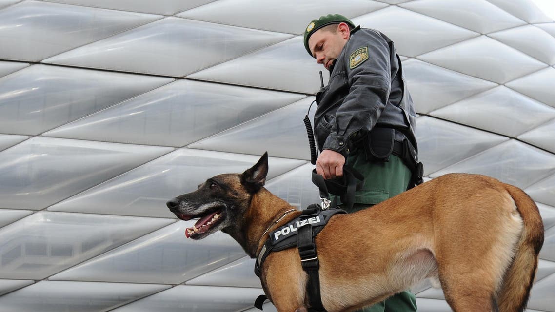 A police officer with his dog