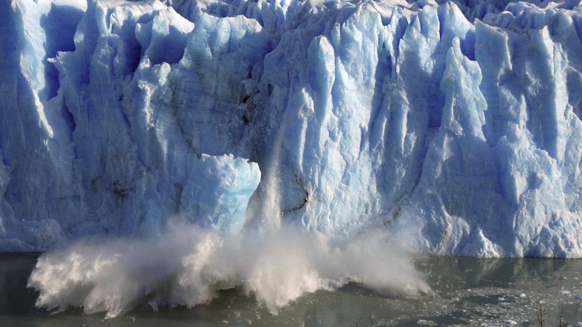 Splinters of ice peel off from one of the sides of the Perito Moreno glacier in a process of a unexpected rupture