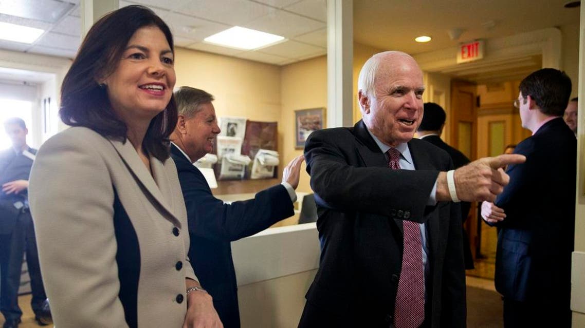 Sen. Lindsey Graham and Senate Armed Services Committee Chairman Sen. John McCain arrive before a news conference on Capitol Hill in Washington, Jan. 13, 2015 | AP