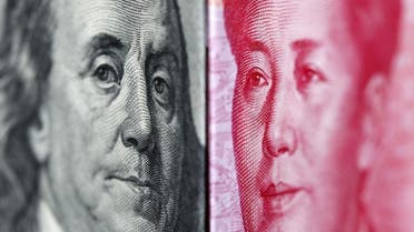 A 100 yuan banknote is placed beside a U.S. 100 dollar banknote in this illustrative file photograph taken in Taipei on June 20, 2010 | Reuters