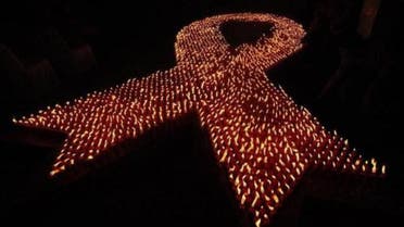 About 2880 candles are seen lit during a World AIDS Day event in Jakarta December 1, 2009. (Reuters)