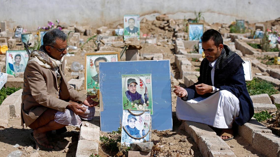 Yemeni Shiites, known as Houthis, offers prayers at the grave of their relative who was killed during fighting in Taiz city, at cemetery in Sanaa, Yemen, Saturday, Nov. 28, 2015. (AP Photo/Hani Mohammed)