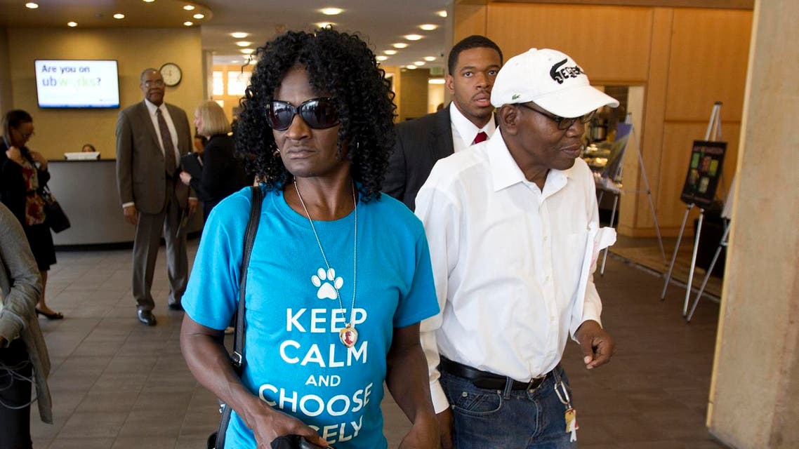 Freddie Gray’s mother, Gloria Darden, accompanied by Freddie’s stepfather Richard Shipley, arriving at Baltimore University to meet with an Attorney General in Baltimore, Md. on Tuesday, May 5, 2015. (File photo: AP)
