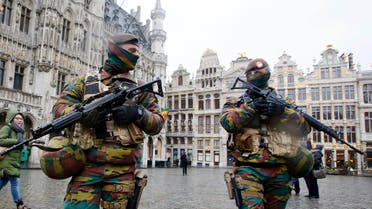  FILE - In this Tuesday, Nov. 24, 2015 file photo, Belgium police officers patrol the Grand Place in central Brussels. A four day lockdown due to a heightened security threat closed the capital’s subways and schools. Officials recommended that popular shopping districts be shuttered and advised people to avoid public places since they could be targeted by extremists. (AP Photo/Michael Probst, File)