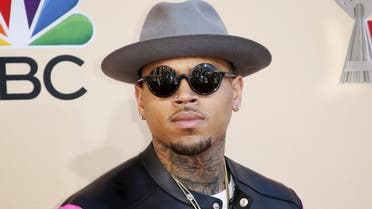 File photo of singer Chris Brown posing at the 2015 iHeartRadio Music Awards in Los Angeles. (Reuters)