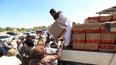 Aid provided by the UAE Red Crescent is distributed in Yemen's northern province of Marib November 26, 2015. REUTERS/Ali Owidha