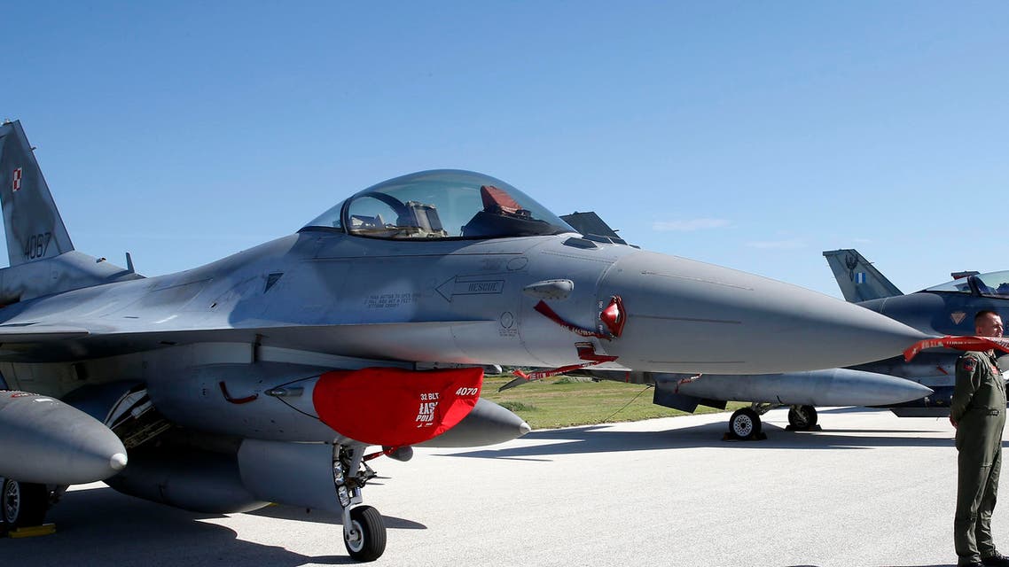 A F16 jet fighter, foreground, is parked on the tarmac during the opening ceremony of NATO Trident Juncture exercise 2015, in Trapani, Italy, Monday, Oct. 19, 2015. (AP)