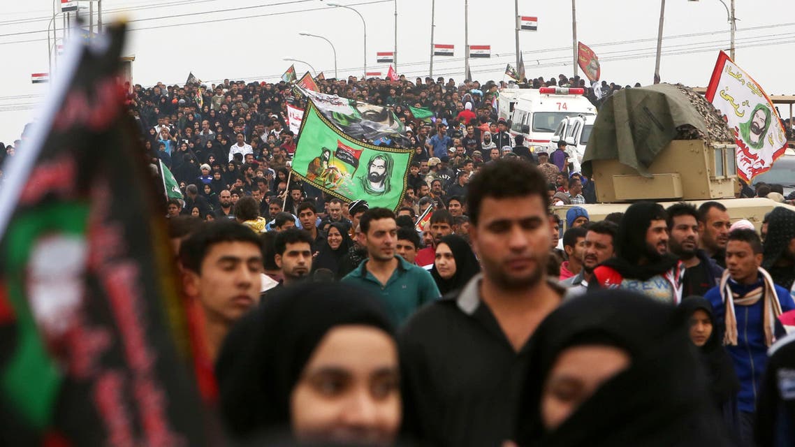 Shiite pilgrims make their way to Karbala for Arbaeen, in Basra, 340 miles (550 kilometers) southeast of Baghdad, Iraq, Thursday, Dec. 3, 2015.