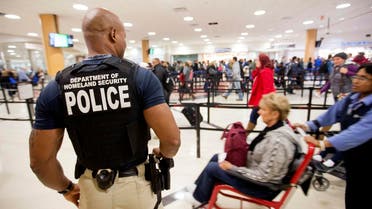 A Department of Homeland Security police officer stands watch at a security checkpoint at Hartsfield–Jackson Atlanta International Airport. (File photo: AP)