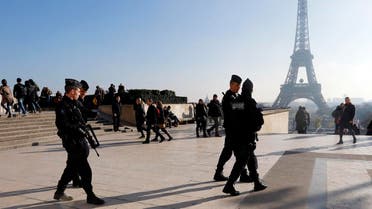 French police officers patrol near the Eiffel Tower, in Paris, Monday Nov. 23. (AP)