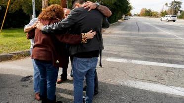 Local residents as they wait to return to their homes near the scene of the investigation of an SUV where two suspects were shot by police following a mass shooting in San Bernardino, California December 3, 2015. Authorities on Thursday were working to determine why Syed Rizwan Farook 28, and Tashfeen Malik, 27, opened fire at a holiday party of his co-workers in Southern California, killing 14 people and wounding 17 in an attack that appeared to have been planned. REUTERS/Mike Blake