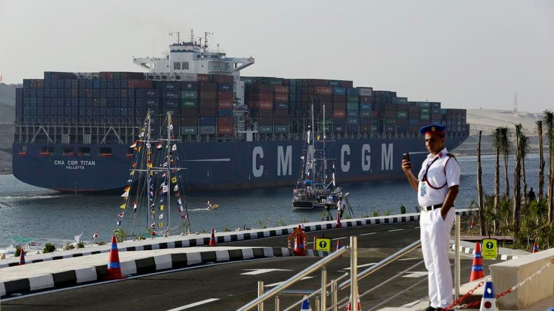 A cargo container ship crosses the new section of the Suez Canal after the opening ceremony in Ismailia, Egypt, Thursday, Aug. 6, 2015 | AP
