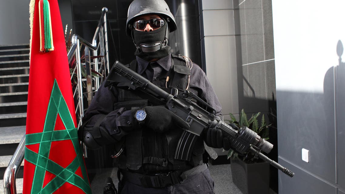 A Moroccan special anti-terror units poses in the new headquarters of the Central Bureau of Judicial Investigations in Sale, near Rabat, Morocco, Monday April 20, 2015.