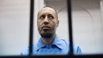 Qaddafi son in Libya court over murder, repression 